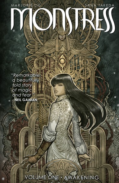 Cover of Monstress graphic novel shows a young woman with long dark hair standing facing a shrine. She has turned her head to look back over her shoulder at the camera.
